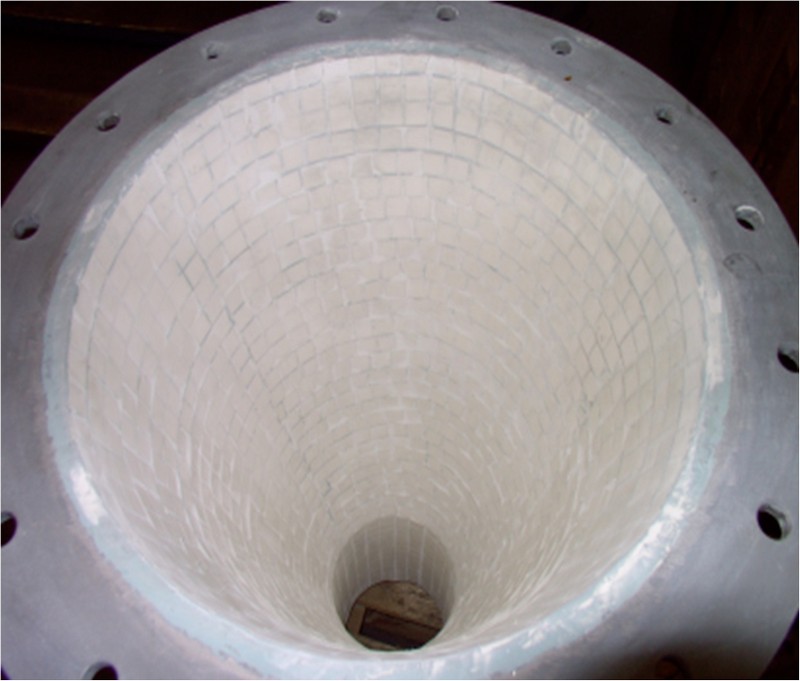 Lining of cyclones for high temperature gases cleaning, including those containing abrasive dust